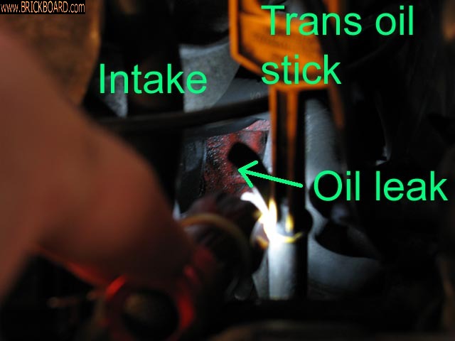 Volvo 200 -- 240  head gasket oil leak below intake