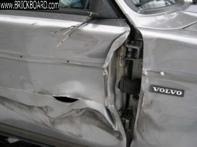Volvo  -- 240 Door Damage