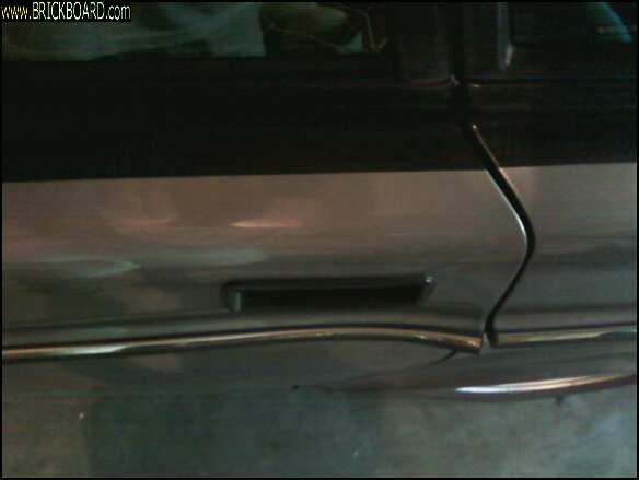 Volvo 200 -- Volvo 240 passenger door dent