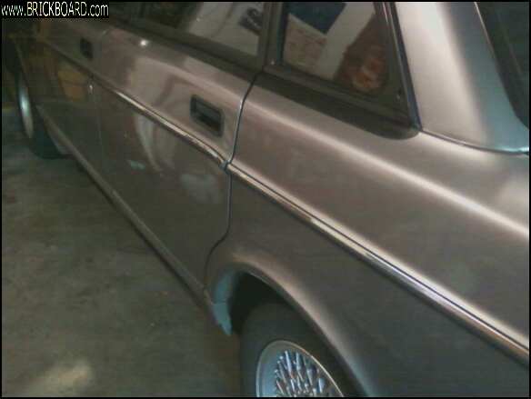 Volvo 200 -- 240 rear door ding
