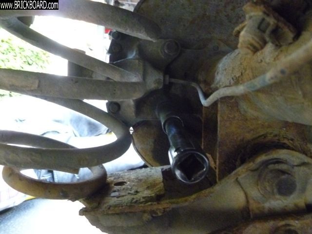Volvo 200 -- Dragging rear caliper, stuck bolt