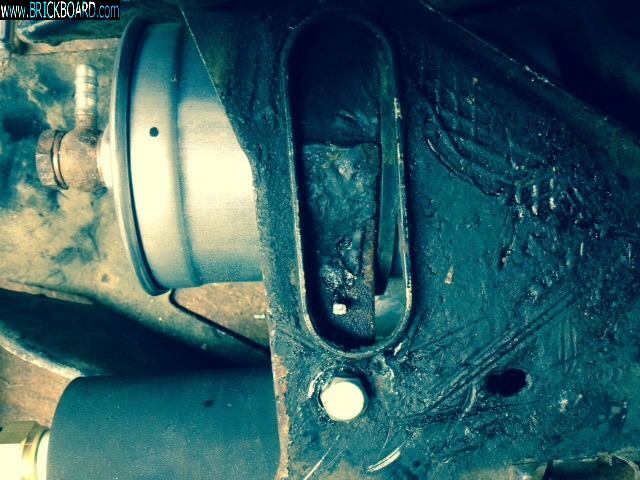 Volvo 200 -- '88 fuel filter bracket part with no home.