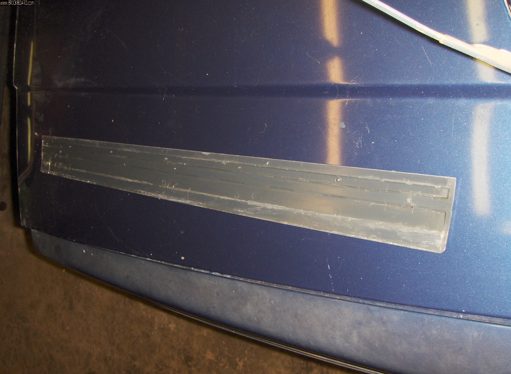 Volvo 200 -- Removing old adhesive from molding