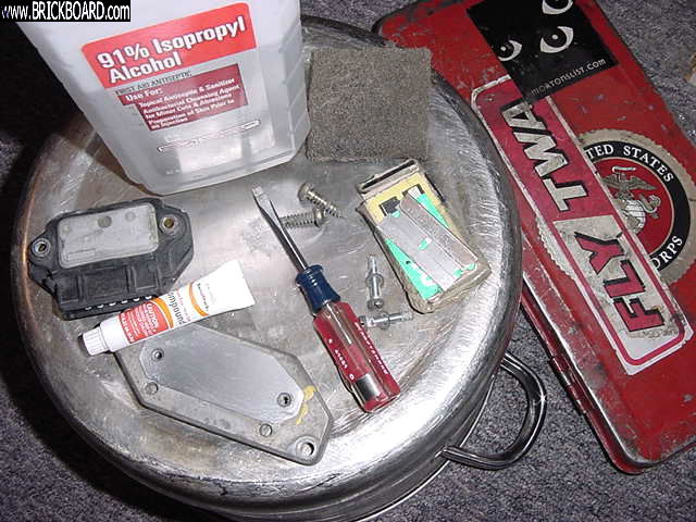 Volvo  -- Refreshes Bosch EZK 1xx Power Stage Thermal Paste between IC Signal Amplifier back side and aluminum heat sink.