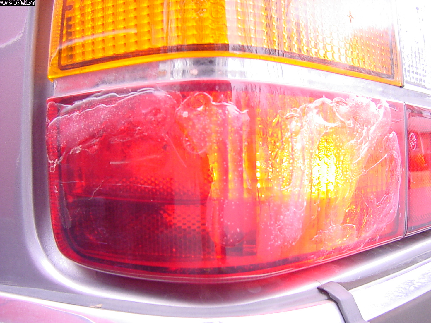 Volvo  -- Rain water in red lens brake taillight reflector chamber ....