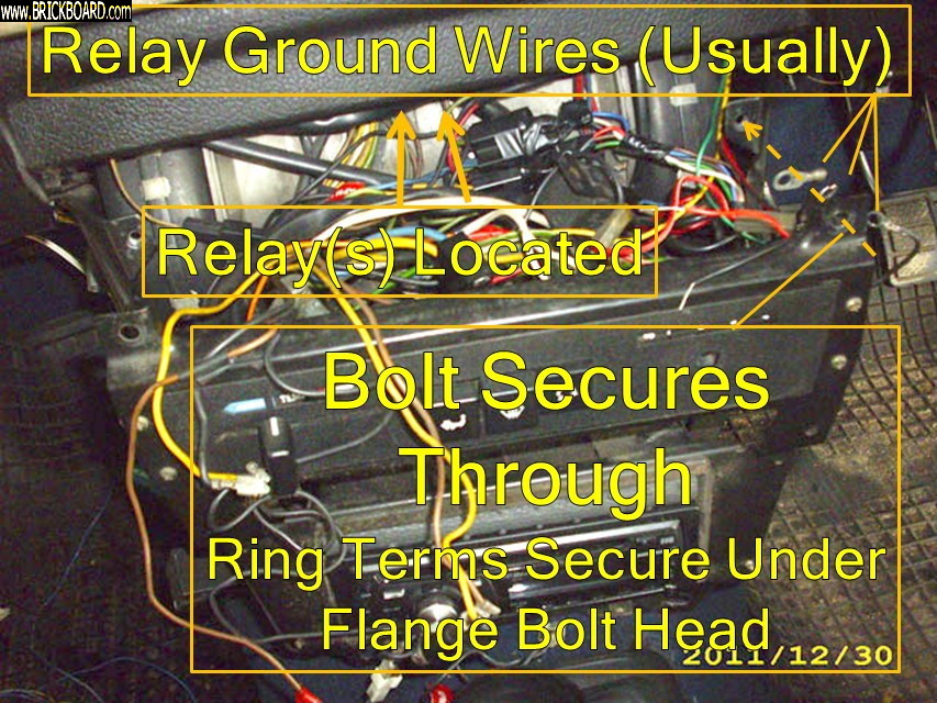 Volvo  -- Indicates Power Windows Ground Location in Volvo 240 Dash Steel Frame Center Console