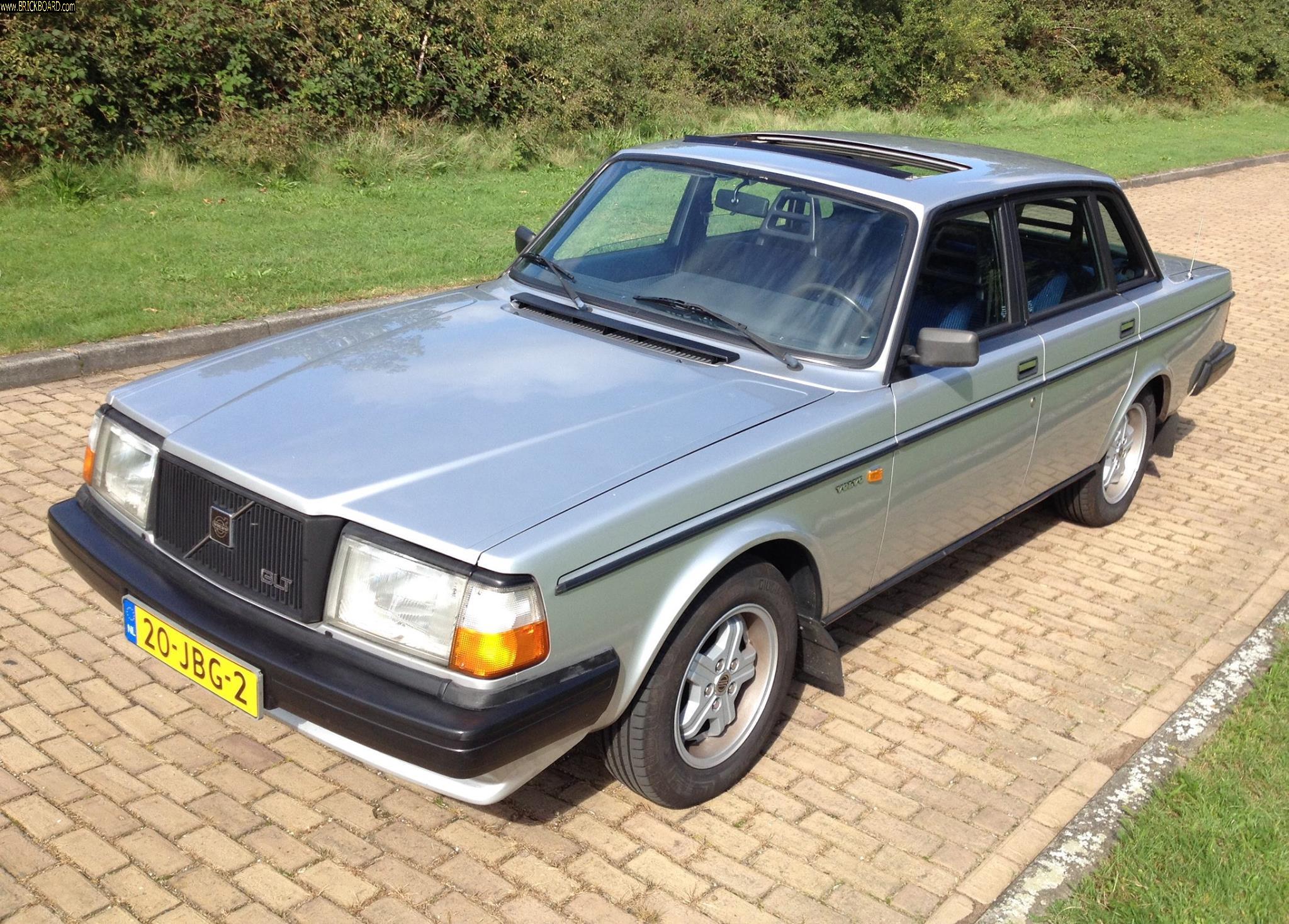 Volvo  -- Volvo 244 in Europa somewheres. With teh Virgos and moon roof.