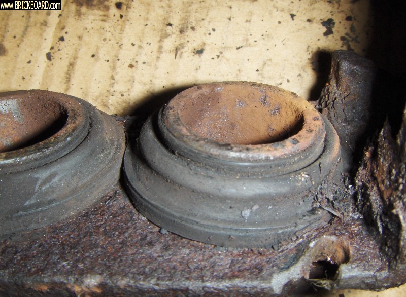 Volvo 200 -- Caliper, broken casting, rusted pin