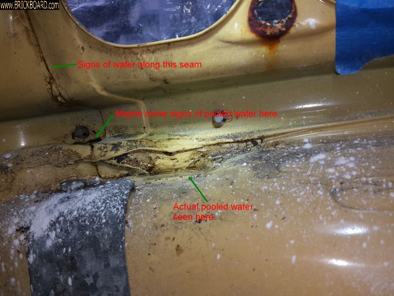 Volvo 200 -- Some puddled water