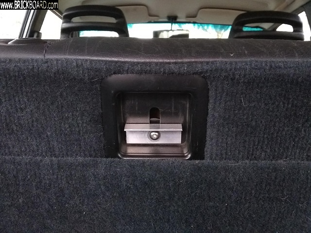 Volvo 200 -- hacked rear seat release handle