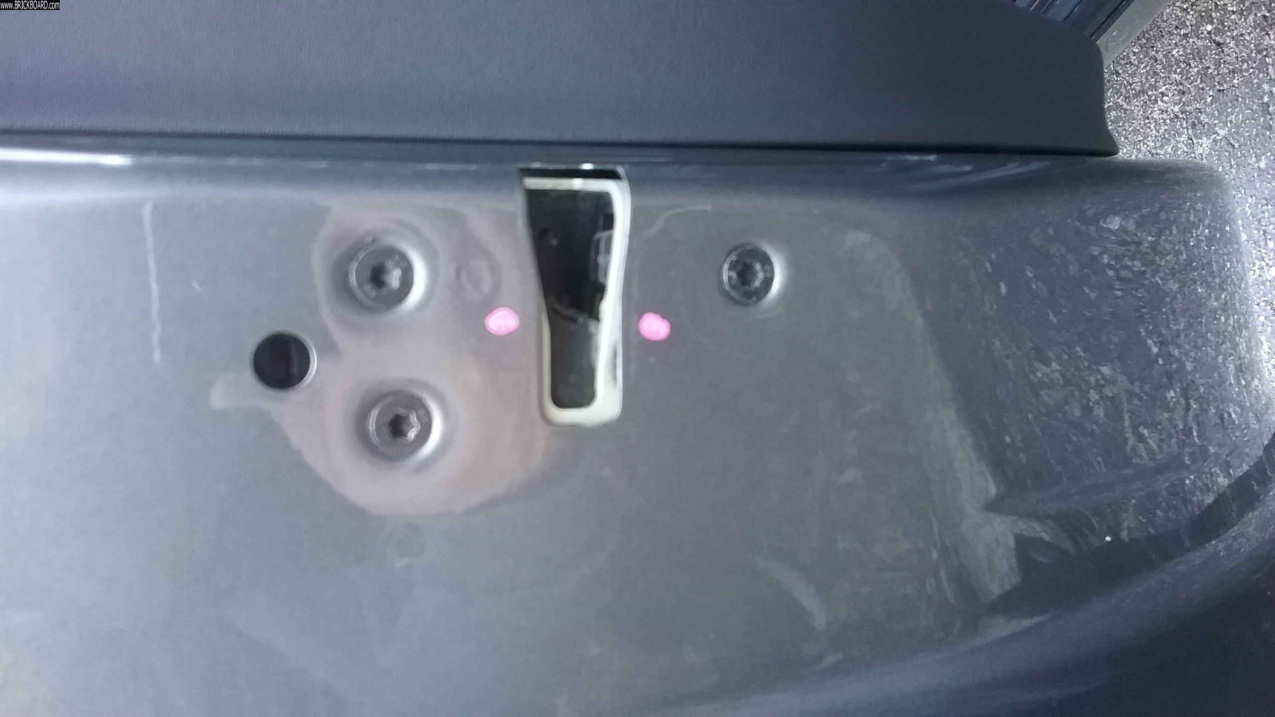 Volvo S60 -- V60 - was this latch adjusted - pink dots