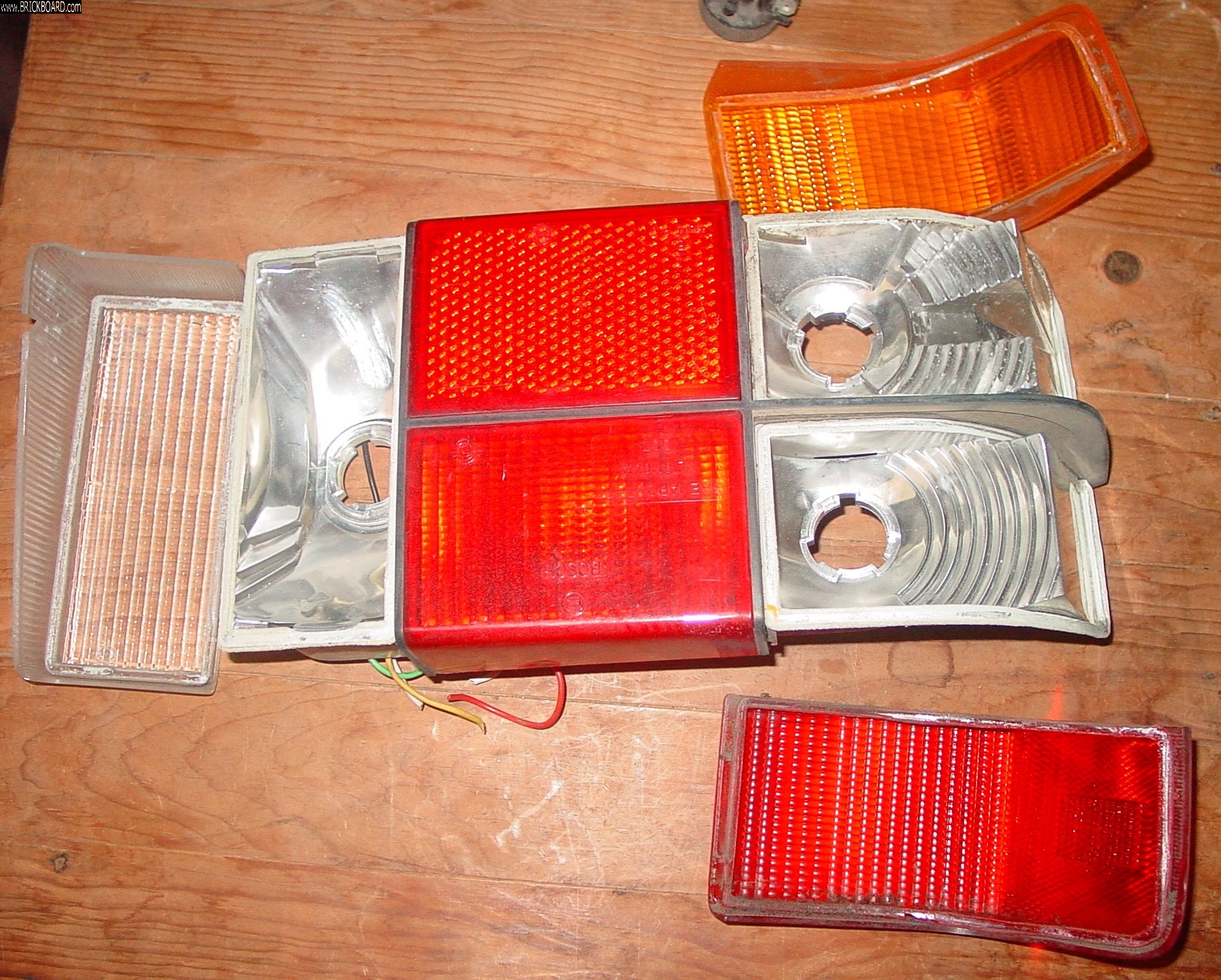 Volvo 200 -- Re-glue 5-panel tail light lens to tail light assembly
