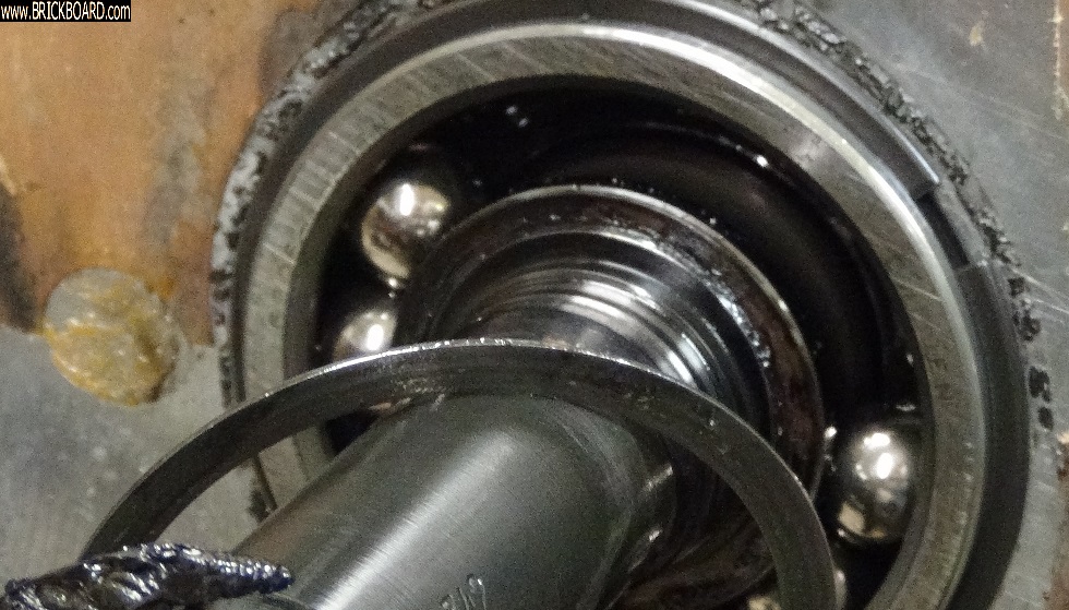 Volvo 200 -- m47 front main shaft bearing gap, shim, and melted plastic