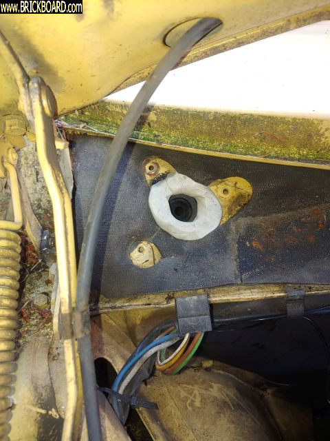Volvo 200 -- Sealing a new wiper motor using plumber's putty