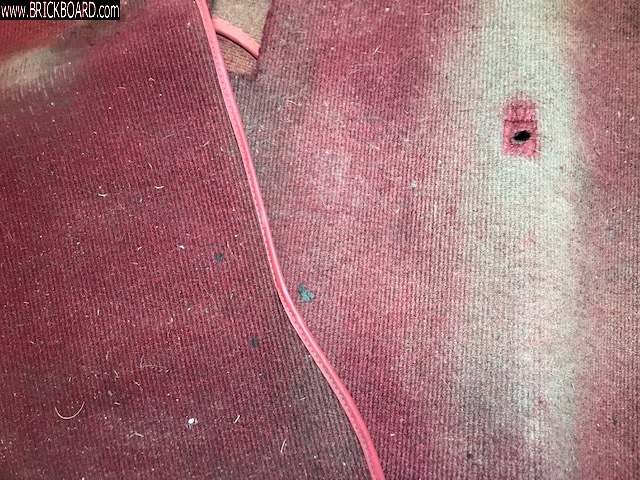 Volvo 1800 -- Aged carpet