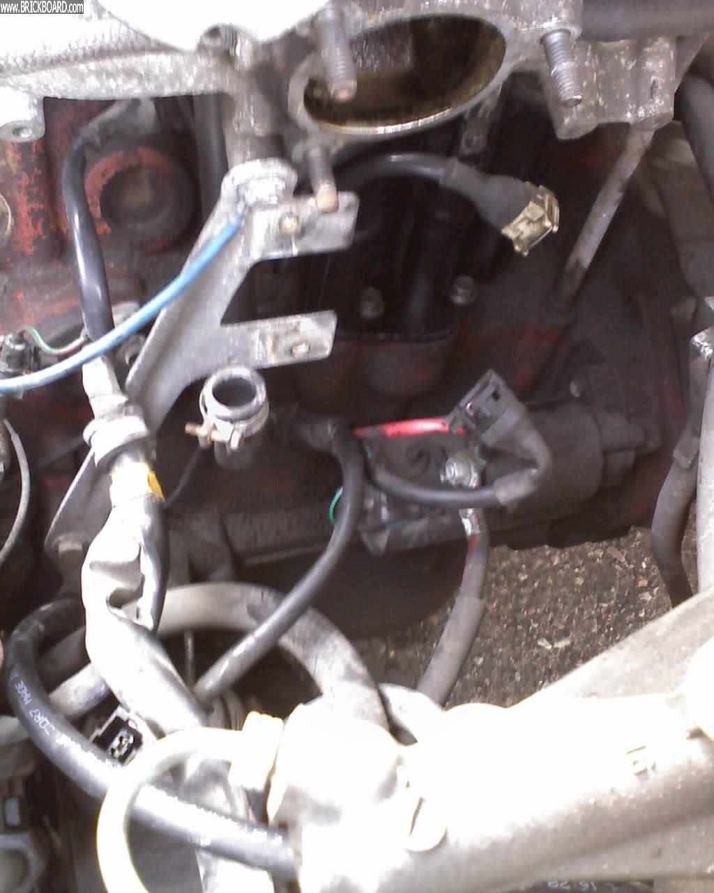 Volvo 700 -- Idle air valve and throttle body removed for oil trap replacement
