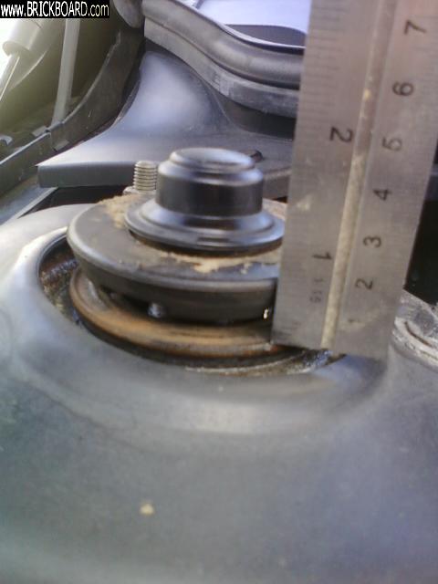 Volvo S60 -- Gap at top of strut?